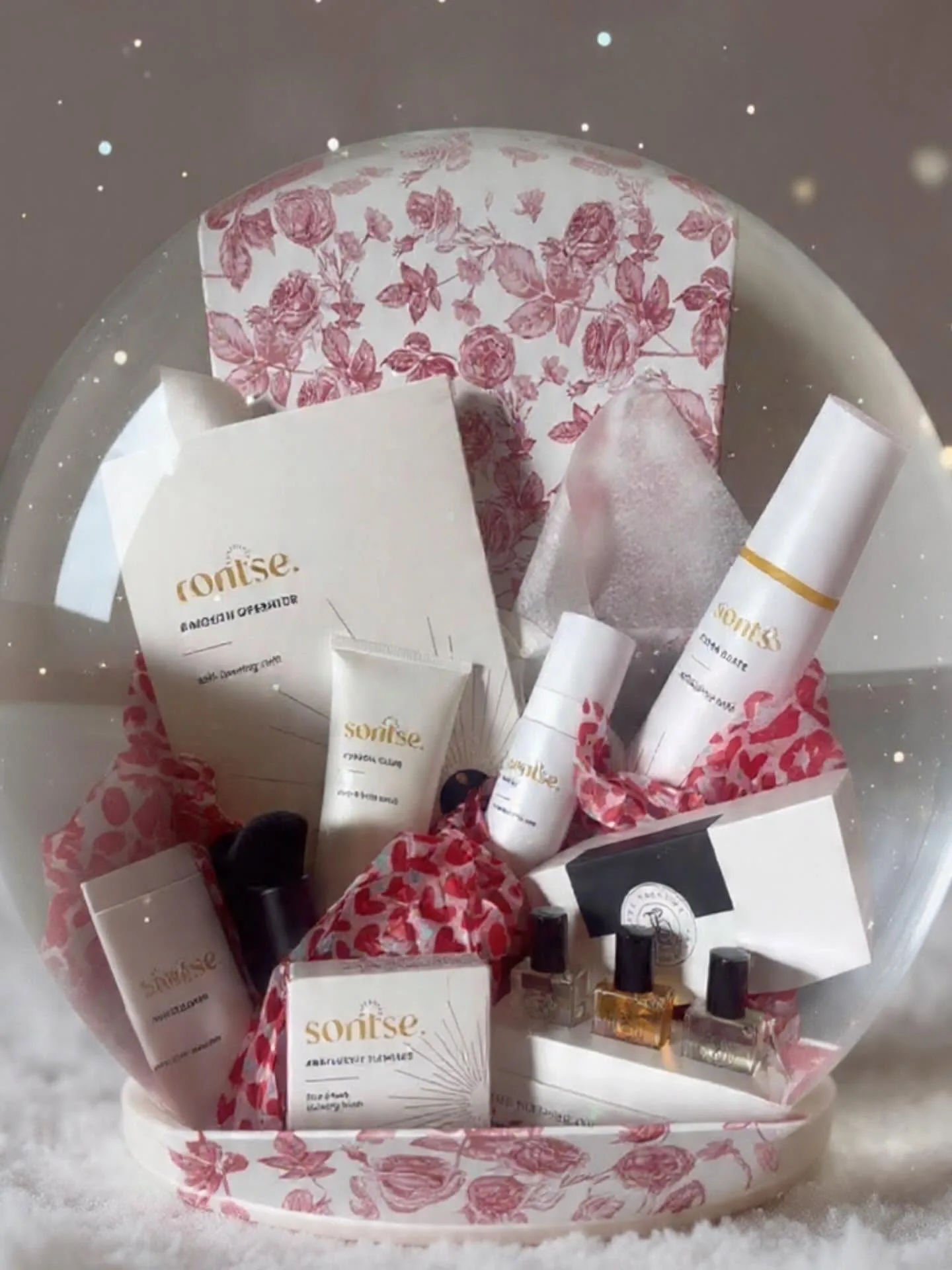 Ms Boudoir gift presentation — Sontse tanning products and perfume oils in a glass dome